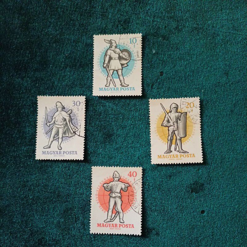 

Stamp Prangko, MAGYAR POSTA, stamp printed in Hungary (Magyar) shows warrior in armor with sword & shield, 15th century; 24th world fencing championships Budapest