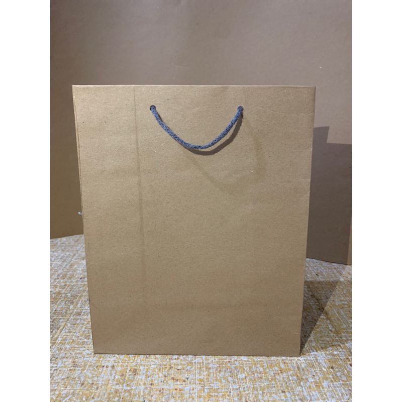 

PAPERBAG POLOS COKLAT (R6 PJG) UK 20x10x25 PAKET 12 PCS