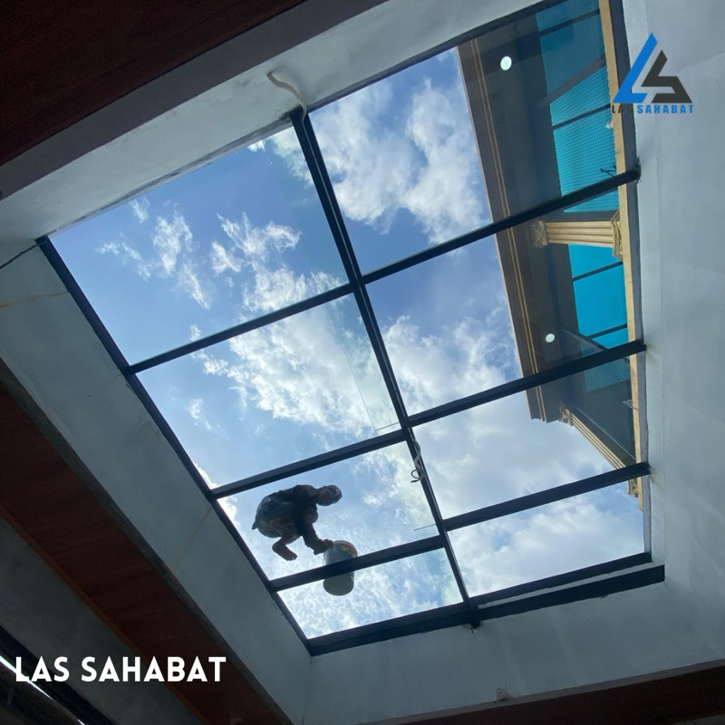 Kanopi kaca sleding atap laminated tempered 5+5