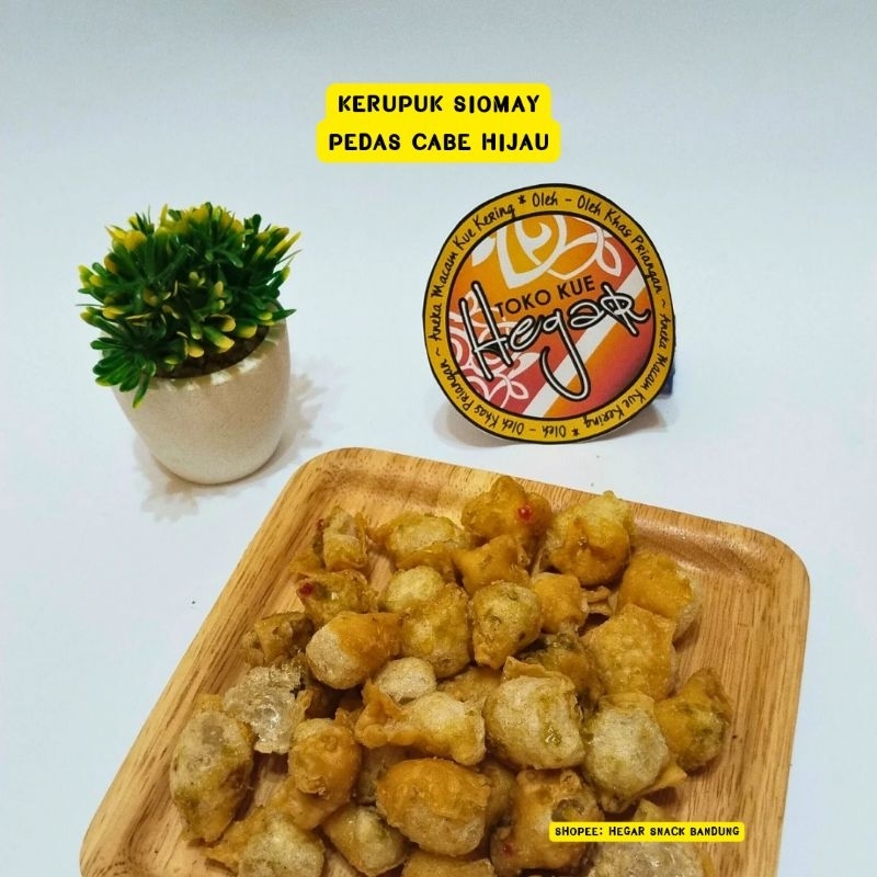 

KERUPUK SIOMAY KILOAN, SIOMAY ASIN, SIOMAY PEDAS CABE HIJAU, SIOMAY PEDAS CABE MERAH