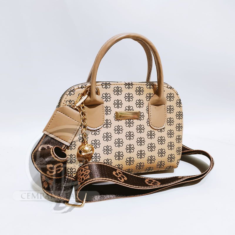 Tas selempang Alma kerang mini motif bunga satu ruangan