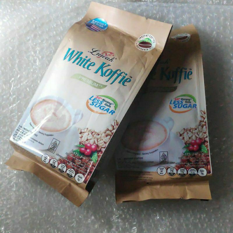 

Luwak White Coffe Less Sugar Pack isi 9 pcs