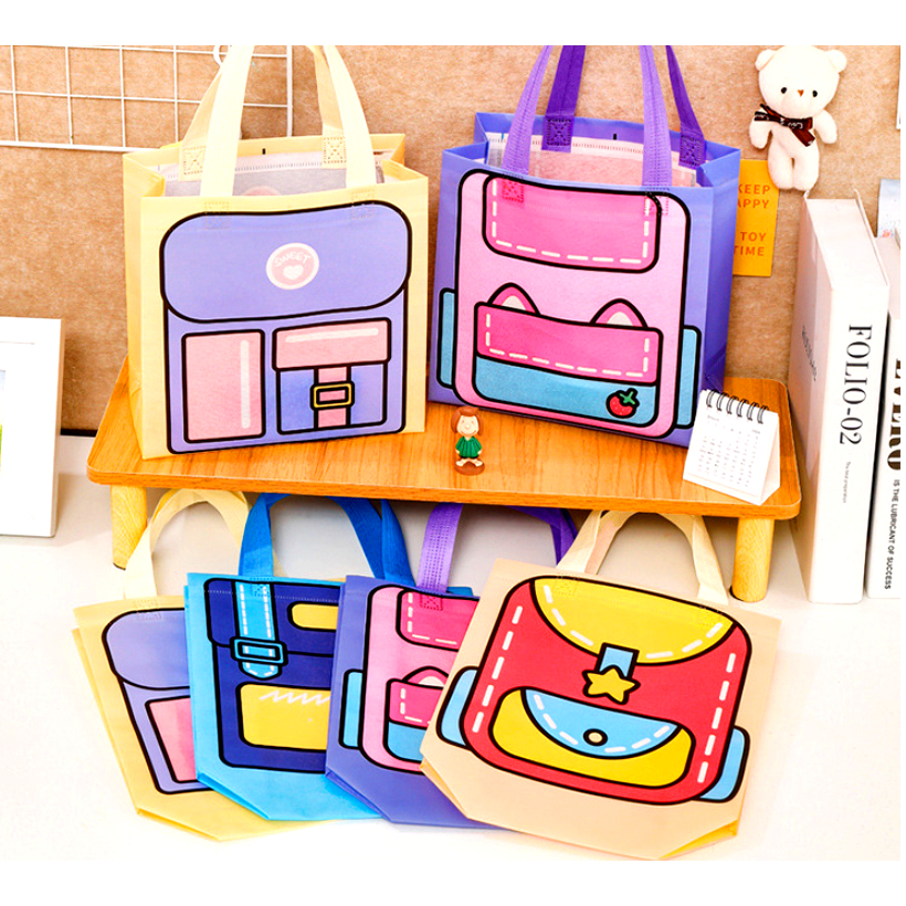 

MS (100PC = 1KG) PB 087 KANTONG BINGKISAN GOODIE BAG SPUNBOND BENTUK TAS KARTUN KADO ACARA PESTA