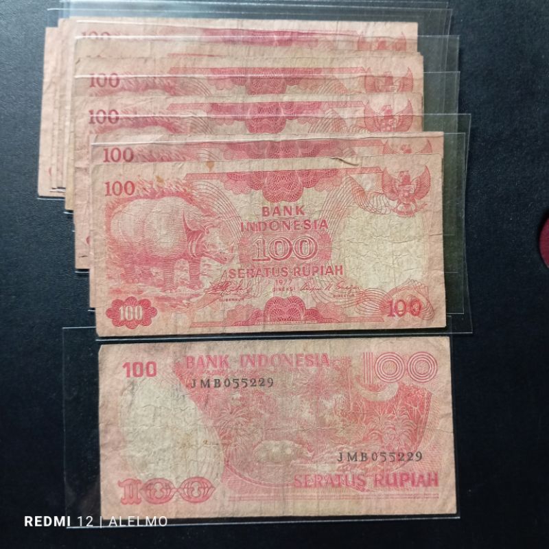 uang kertas kuno 100 badak tahun 1977 bekas asli