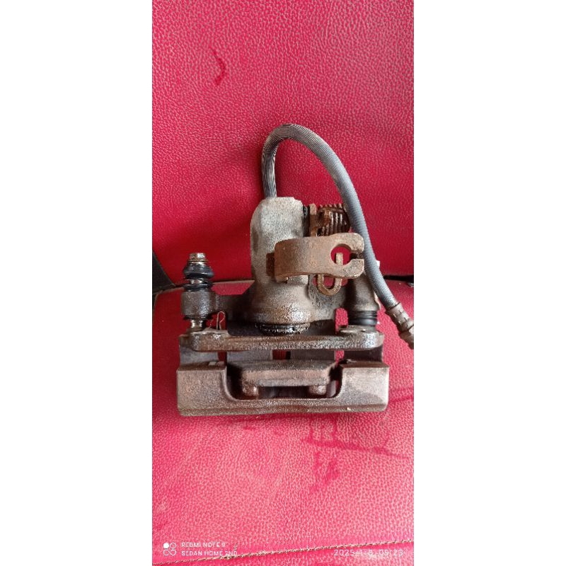 kaliper cakram belakang mitsubishi lancer dangan GTI bagian kiri(L)