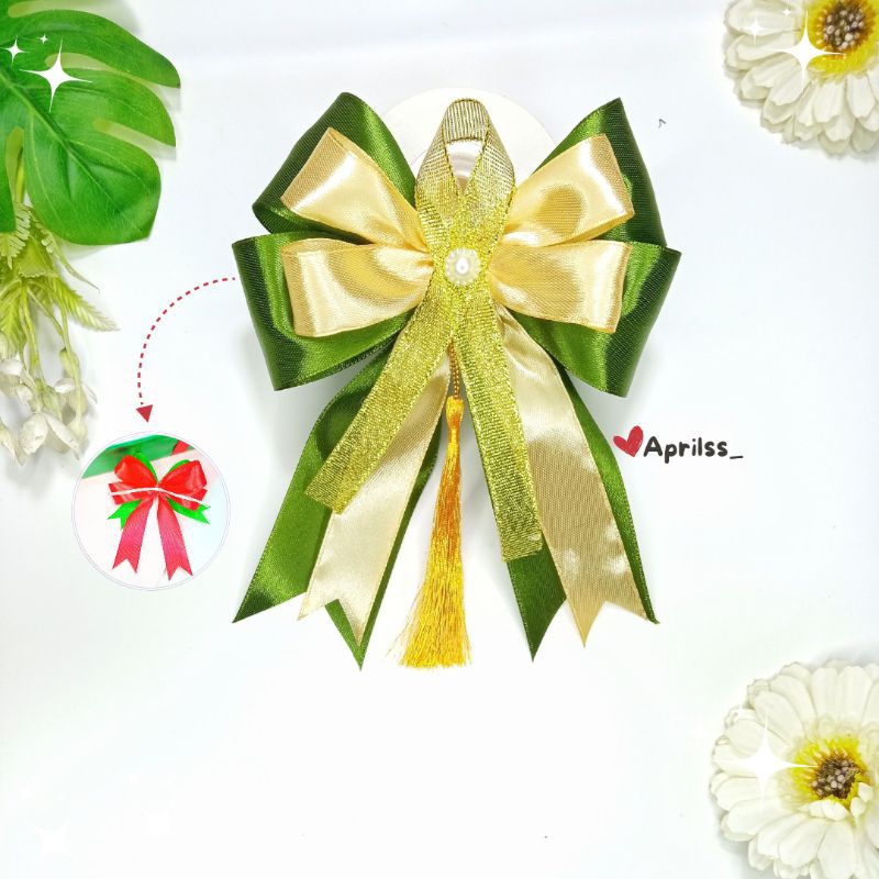 

Pita lebaran besar Tasel | pita Hampers | pita parsel | pita Kado | pita satin