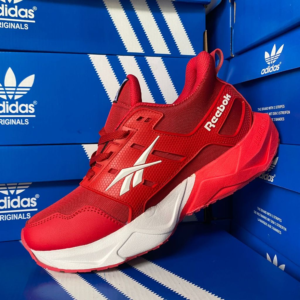 sepatu merah putih pia dan wanita