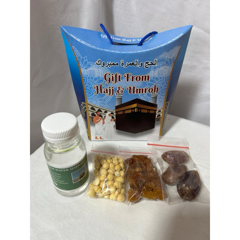 

Oleh oleh haji dan umroh Tas jingjing lengkap 50pcs(air zam zam 80ml full)