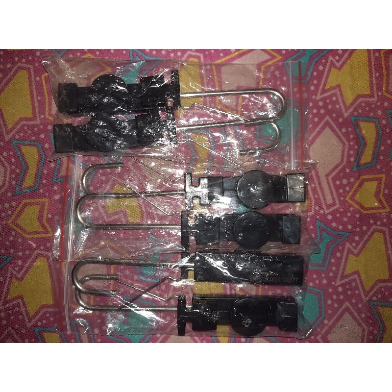 S CLAMP  (pengikat kabel fiber optik)