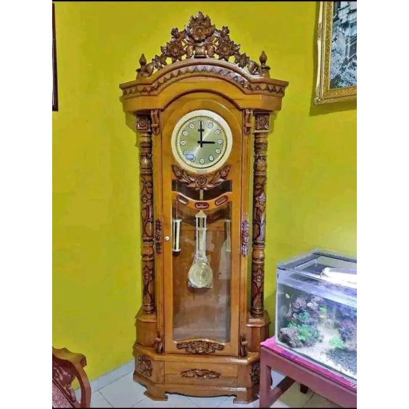 lemari jam kayu jati