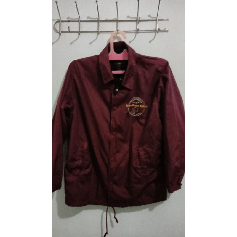 JAKET Coach merah marun bekas ukuran L