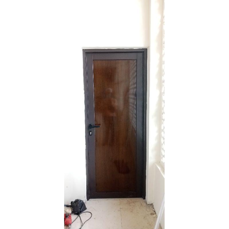 pintu alumunium Dau ACP motif kayu
