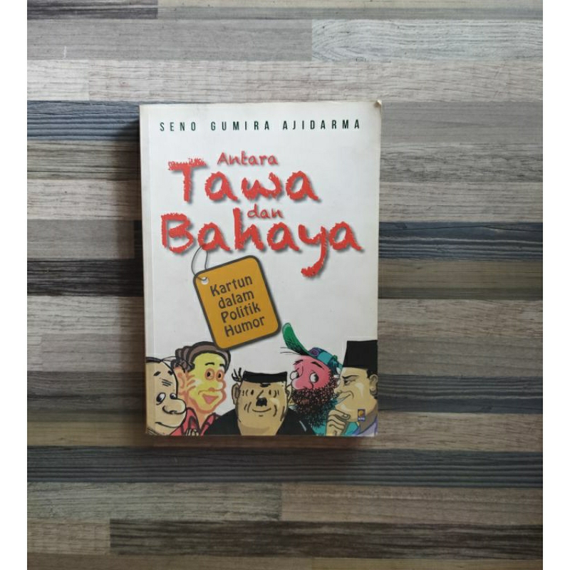 ANTARA TAWA DAN BAHAYA KARTUN DALAM POLITIK HUMOR SENO GUMIRA AJIDARMA