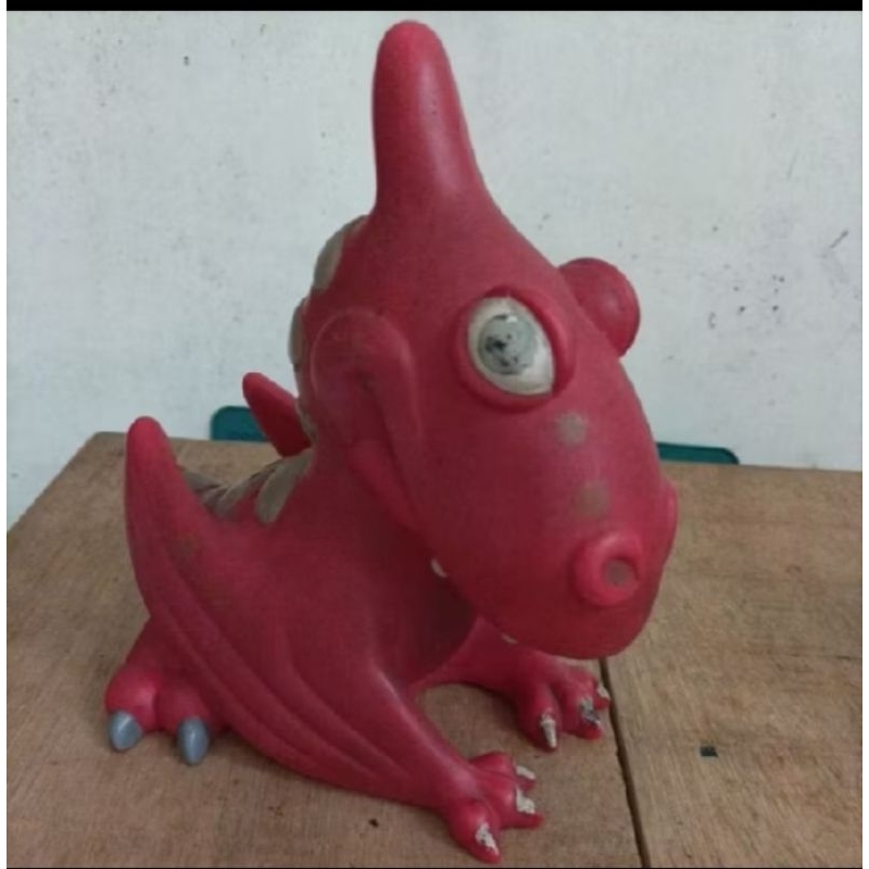 Coin bank dinosaurus