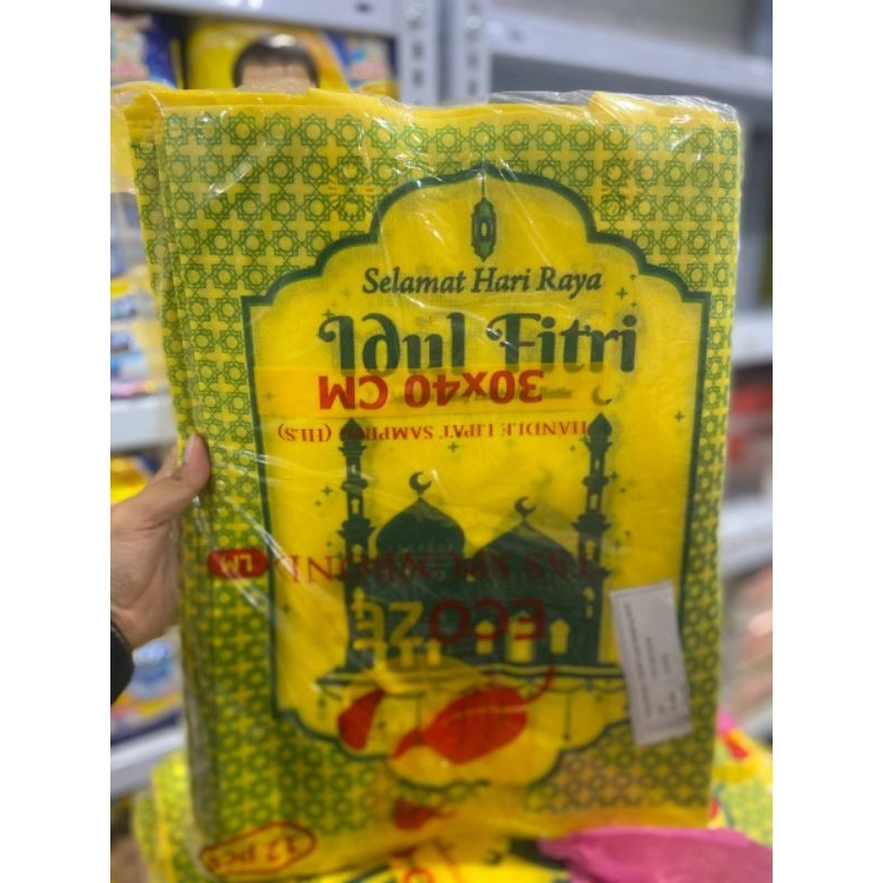 

tas lebaran 30 x 40 cm isi 12 0cs