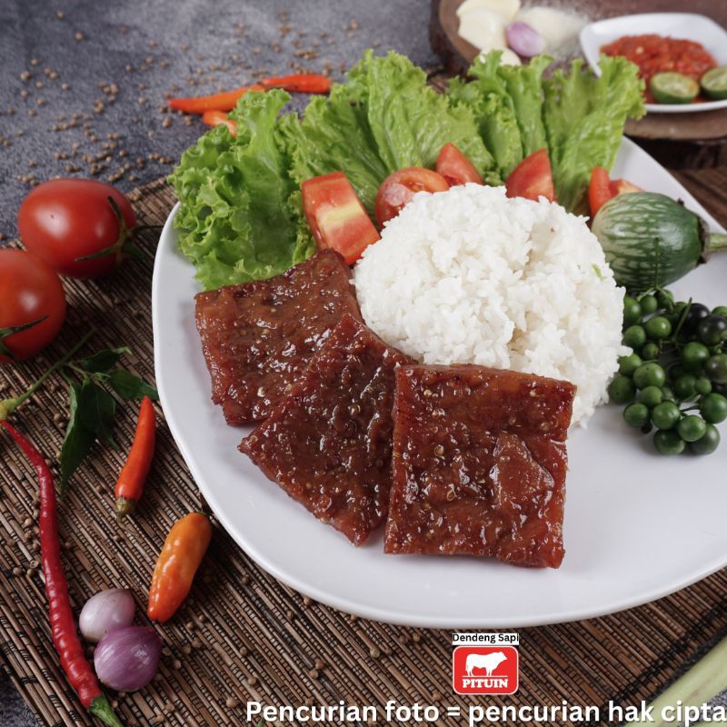 

Dendeng daging sapi 250g + dendeng jando sapi 250g Premium (bersertifikat Halal) rasa original, enak, nikmat & bergizi tinggi.