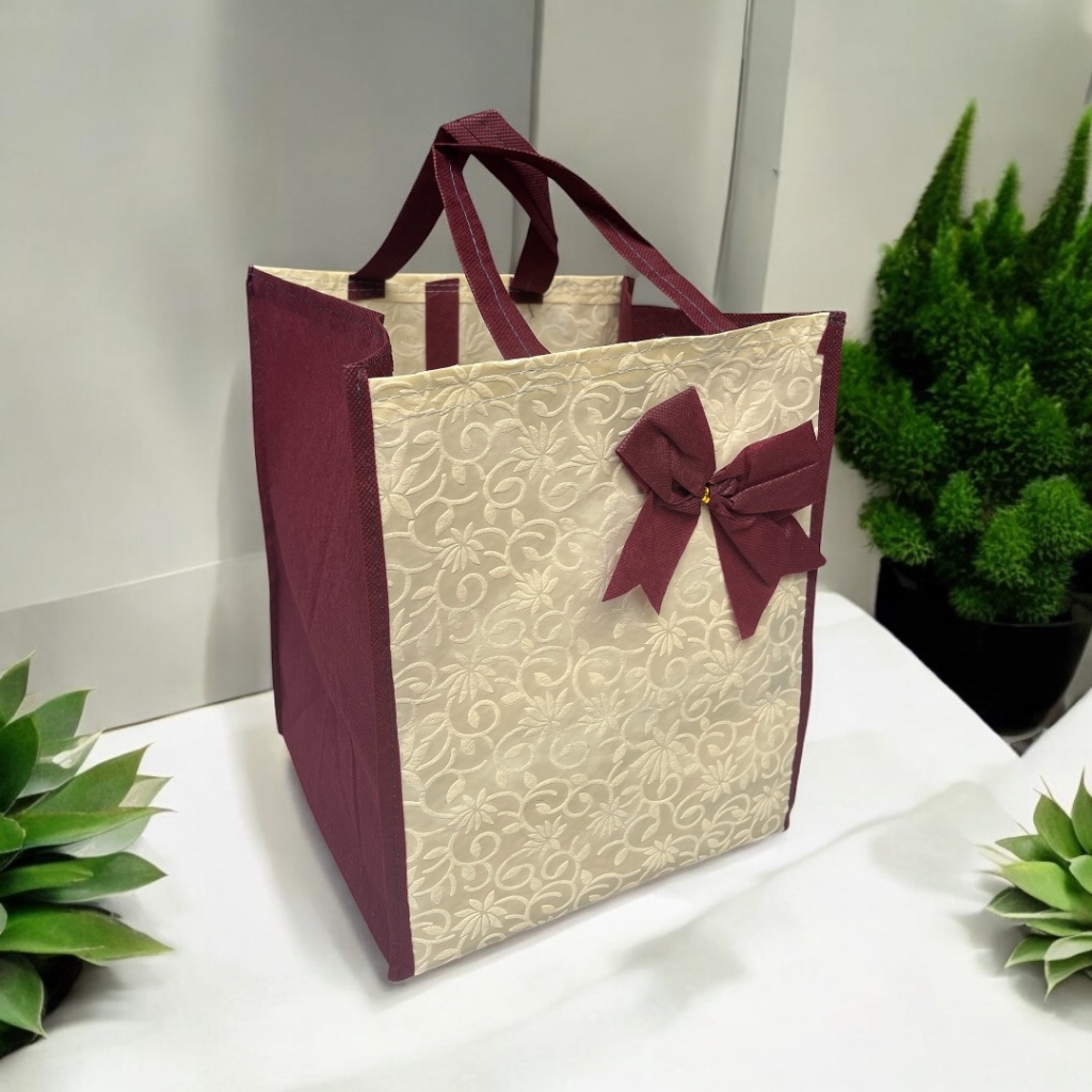 

(12 Pcs) Tas Hajatan Embos Pita 22x22 / Tas Berkat / Tas Spunbond
