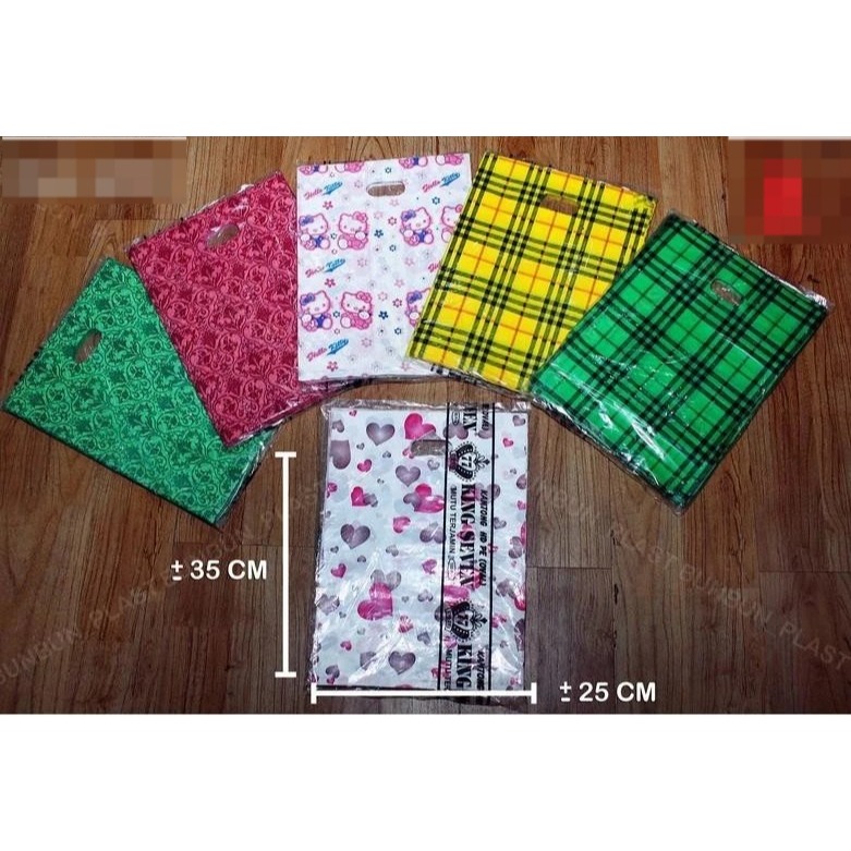 Kantong Plastik Oval Motif KING SEVEN UK. 25x35cm ( isi 100lembar ) Motif Random