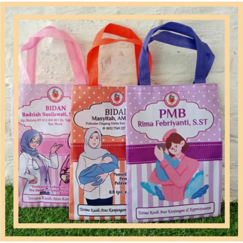 

Tas Bidan/klinik/umum tas buku KIA ukuran 20x30 cm bisa custom gambar sesuai kebutuhan