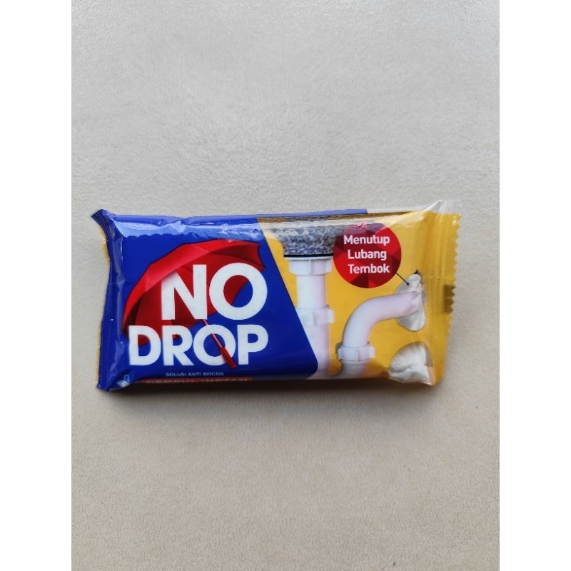 Dempul Instant Nodrop Menutup Lubang Tembok