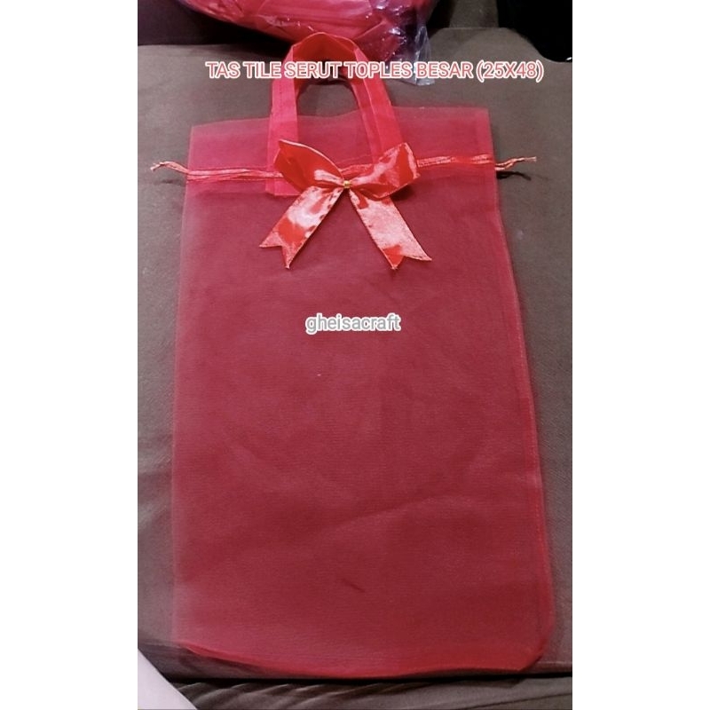 

TAS TILE SERUT TOPLES (25X48CM)