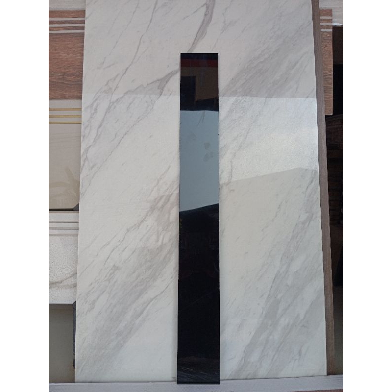 LIS PLIN GRANIT HITAM POLOS 10X80