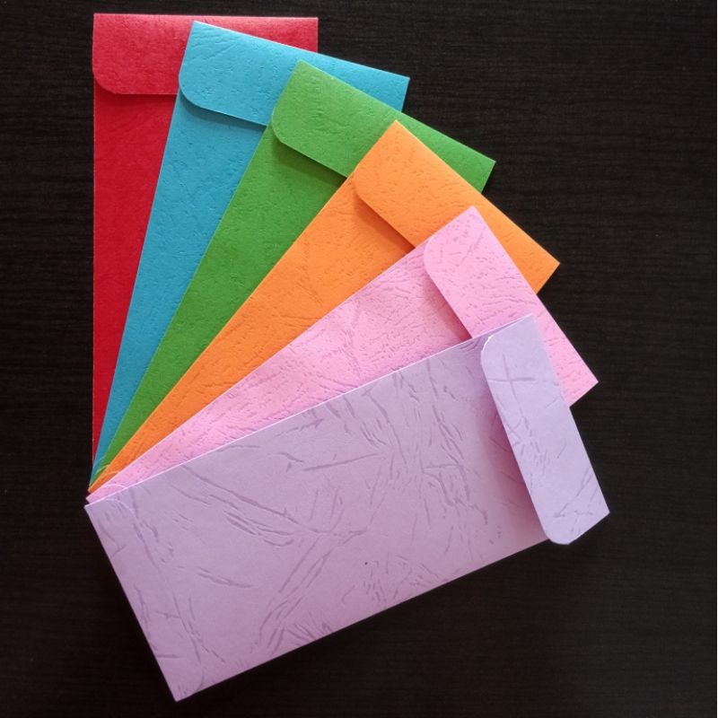 

AMPLOP PANJANG ANGPAO WARNA WARNI LEBARAN IMLEK NATAL 8x16cm