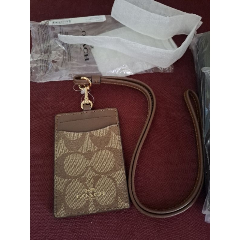 

Lanyard Coach Original Baru