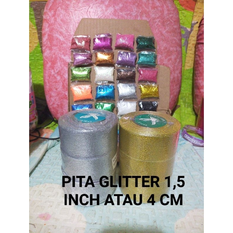

Pita Glitter Emas Perak 1,5 inch atau 4 cm tersedia 2 warna perak dan mas