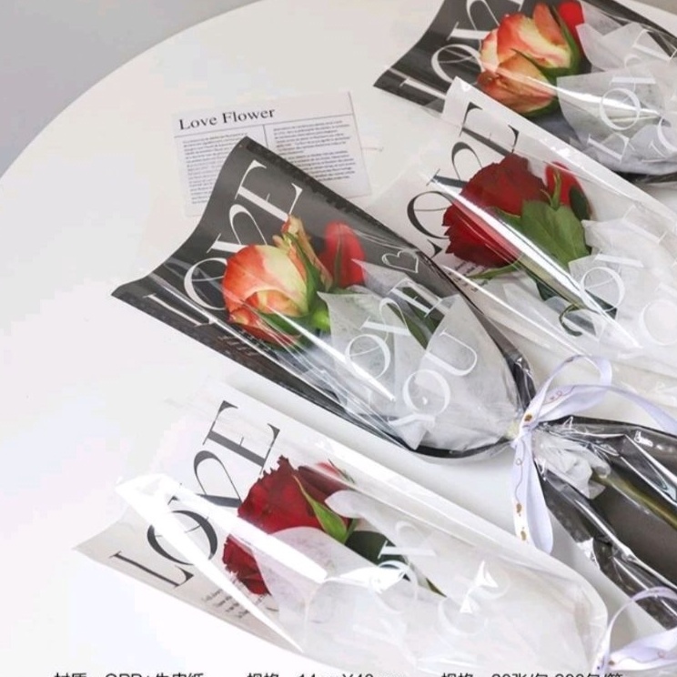 

Paket Populer READY Plastik Bunga LOVE 1 tangkai ecer per lembar Wrapping Plastik untuk Mini Buket Rose 1 pak 2lembar