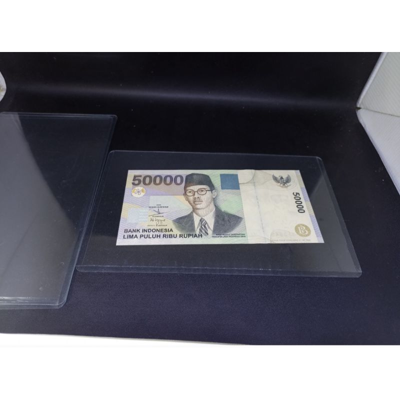mika tebal pelindung uang kuno kertas