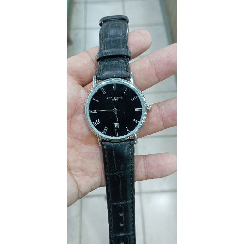 jam tangan pria PTK tipis dan istirahat hitam anti karat snap kulit jam klasik yang fashion pria jam