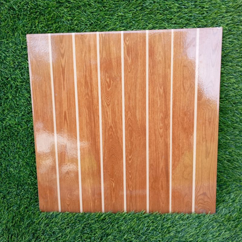 Keramik Lantai Kia 40x40 motif kayu glosy