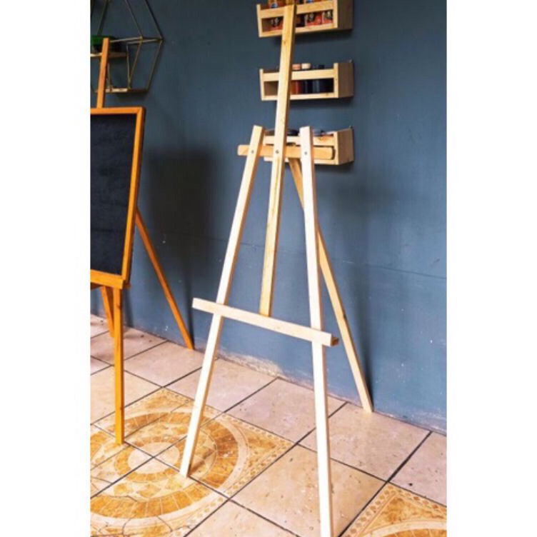 

KODE B34I wooden easel 13 cmstanding tripod kayustand lukis stand foto standing frame akrilik standing poto prewedding kayu aesthetik