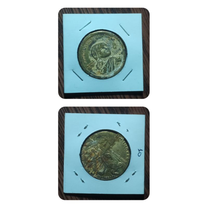 gantungan kunci in god we trust 2018 kondisi bekas