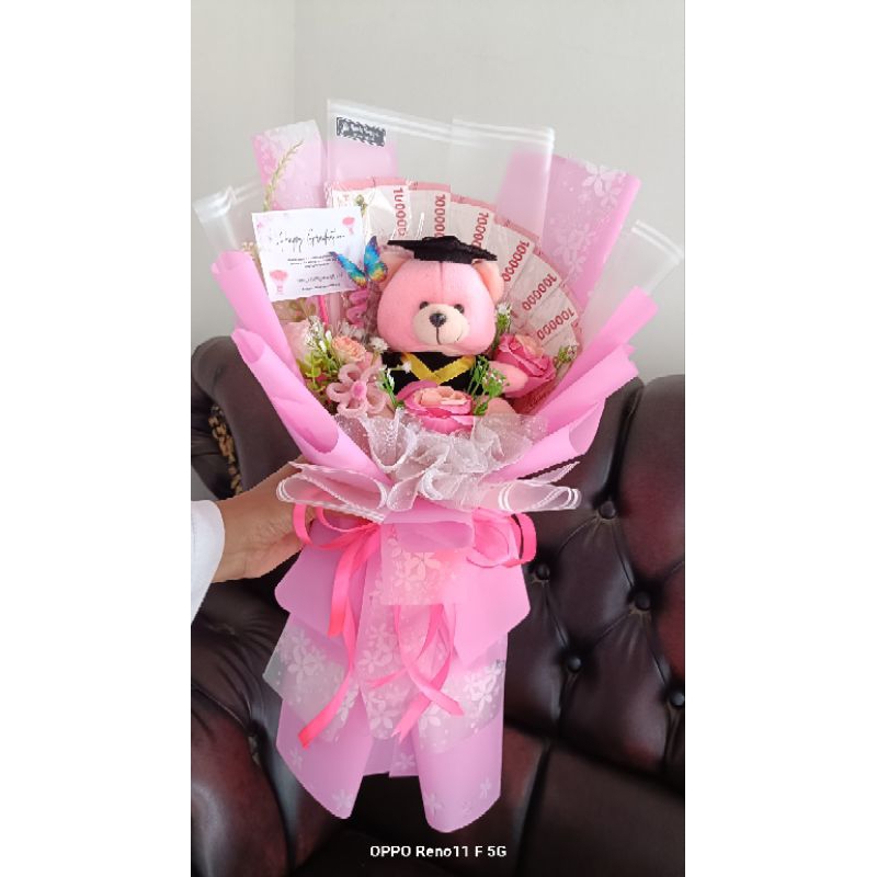 bouquet uang tambah boneka dan bunga
