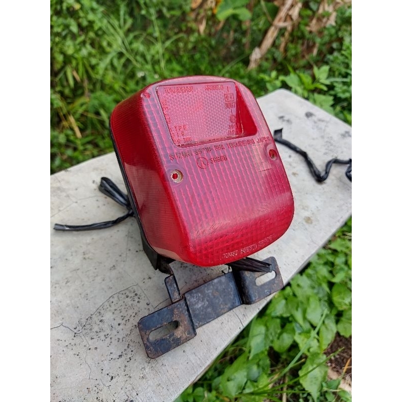 lampu belakang Suzuki TS 125 original copotan motor. kondisi layak pakai