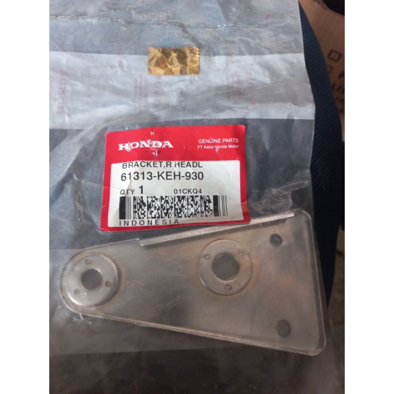 BRACKET ,R HEADL 61313-KEH-930
