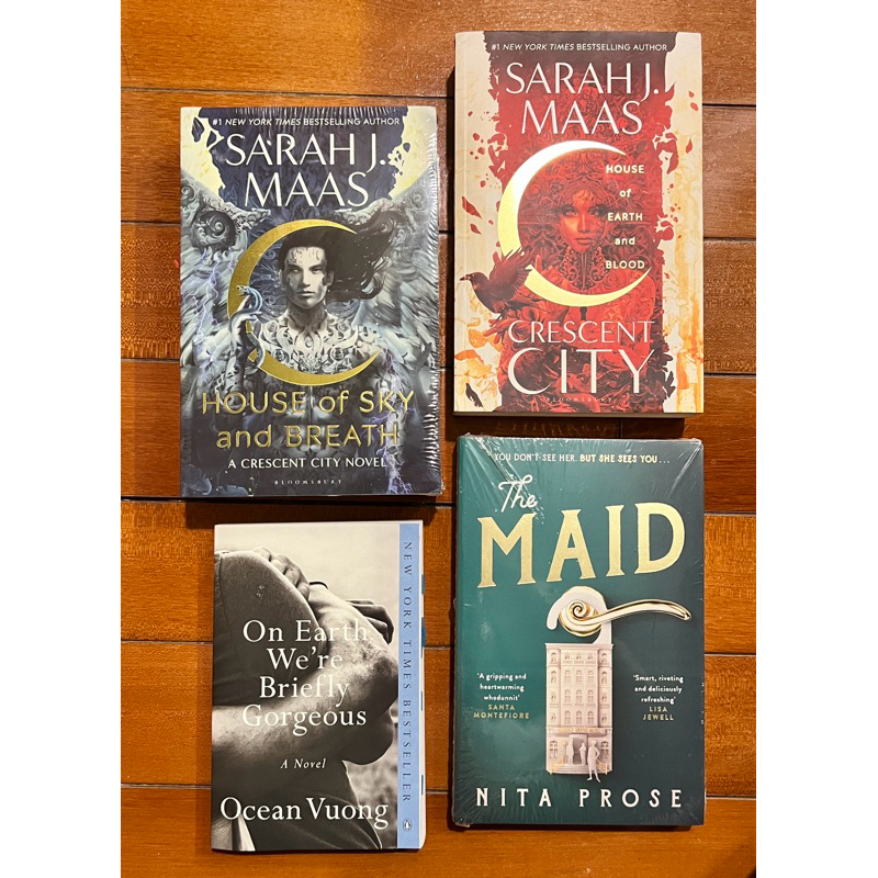 on earth we’re briefly georgeous / the maid / cresent city / house of sky and breath sarah j maas no