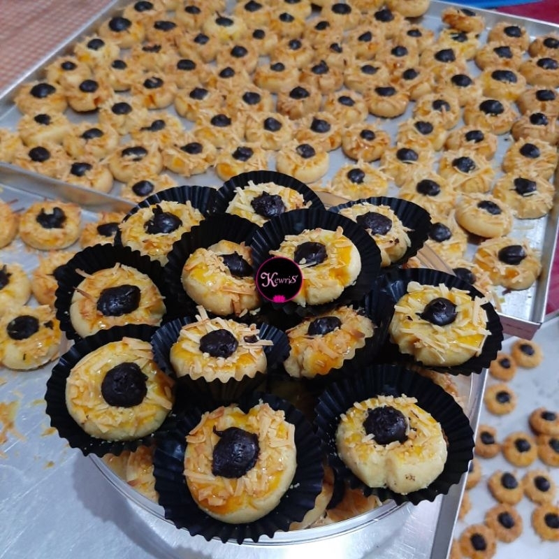 

TUMBPRINT COKELAT/KUE KERING