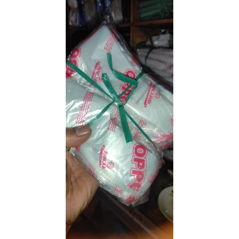 

Kantong Kresek Kantong Plastik Kantong Bening Merk Oppo ukuran 15cmx33cm