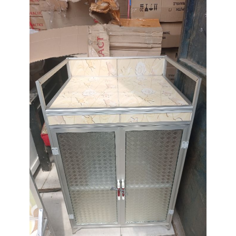 meja kompor rak dispenser. rak kompor. bawah keramik belakang almunium. 2 sekat.