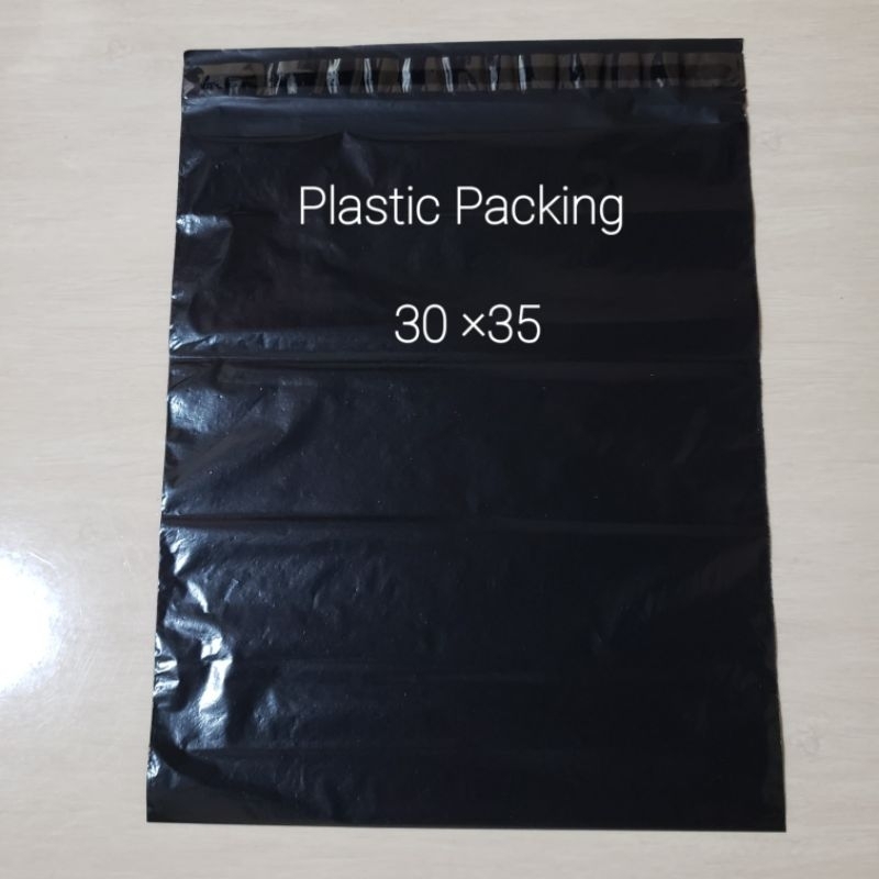 

plastik packing sudah ada perekat hitam