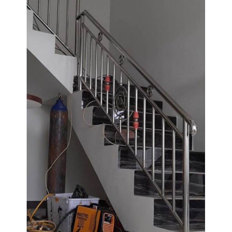 relling tangga stenlis pipa