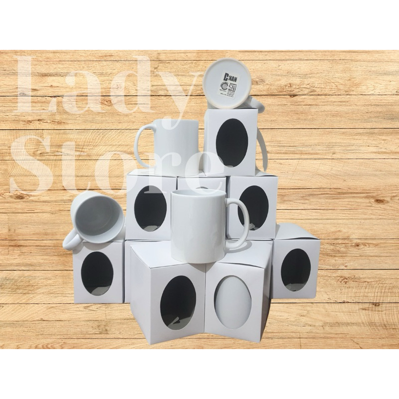 

Dus Mug Lubang Oval Samping Bahan Duplek 310 Gsm TEBAL ( Box dus mug souvenir )