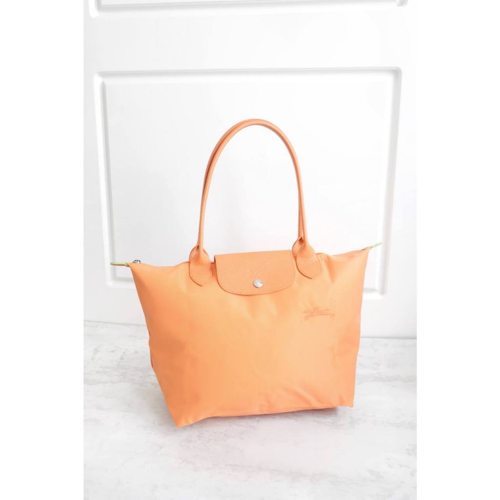 Longchamp le pliage green medium long handle in orange