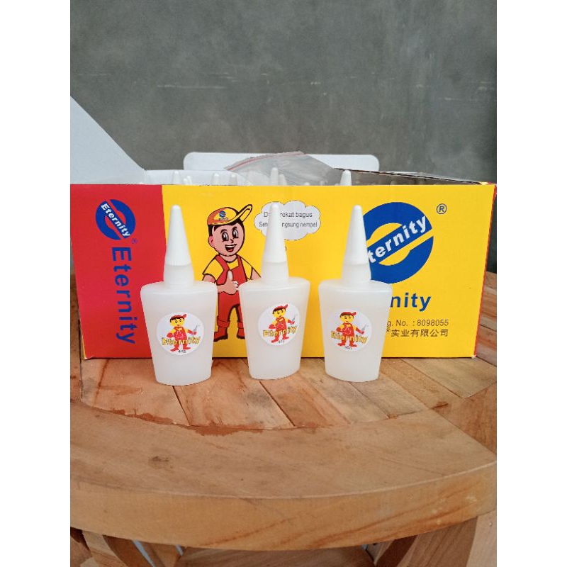 

lem eternity gambar topi isi 40 pcs 1 dus / lem korea lem tetes lem jumbo