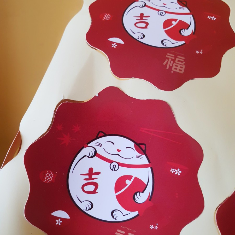 

Sticker Toples Motif Imlek Lucky Cat Bulat 1 Lembar Isi 6 Pcs