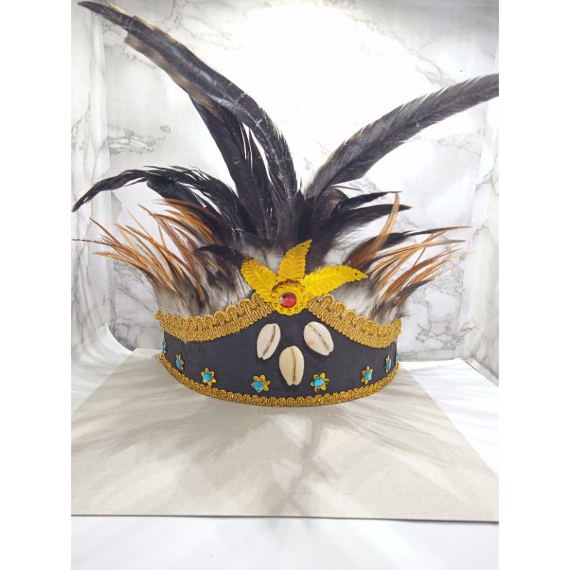 Hiasan kepala topi adat papua kerang