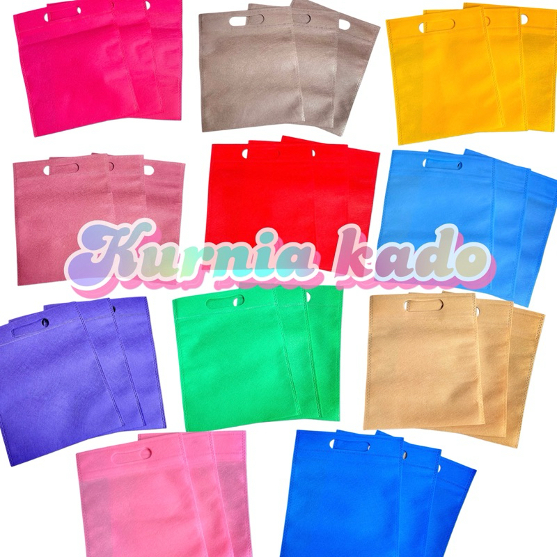 

Tote bag goodie bag polos tas oval tas spunbond tote bag 25 cm x 26 cm paper bag tas kain kurnia kado